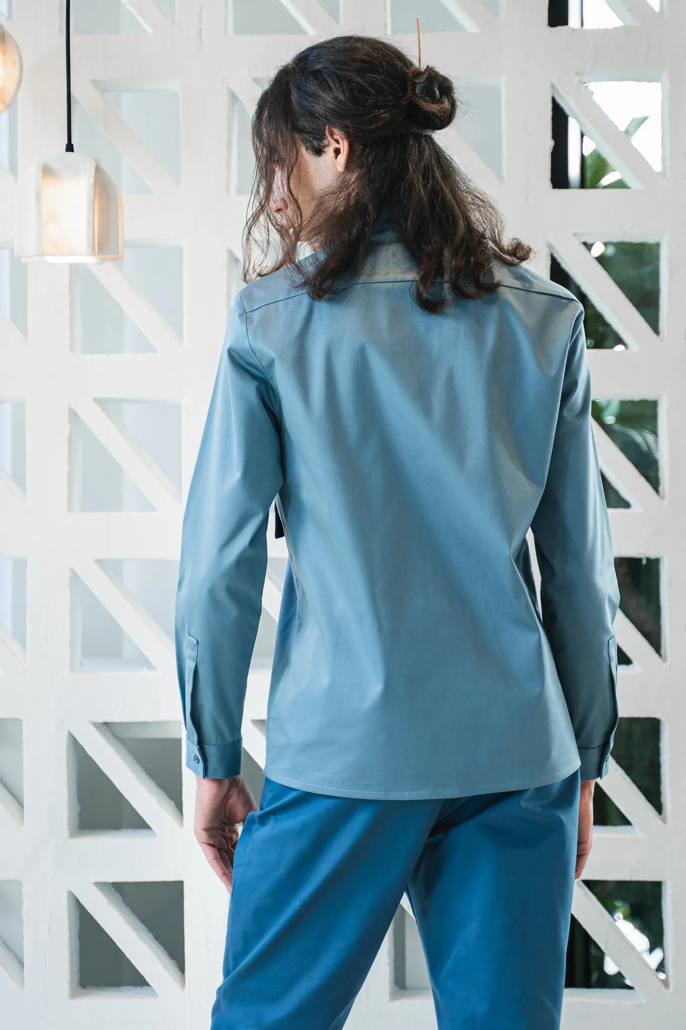 Architectural shirt with kirigami pockets