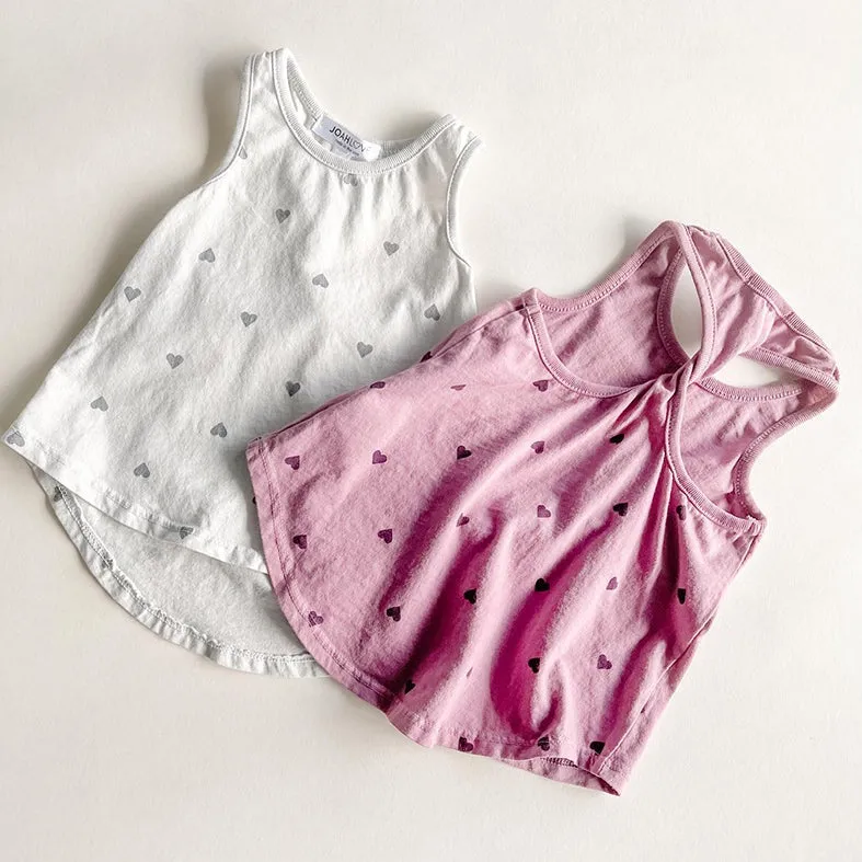Cassie-Heart twist back top