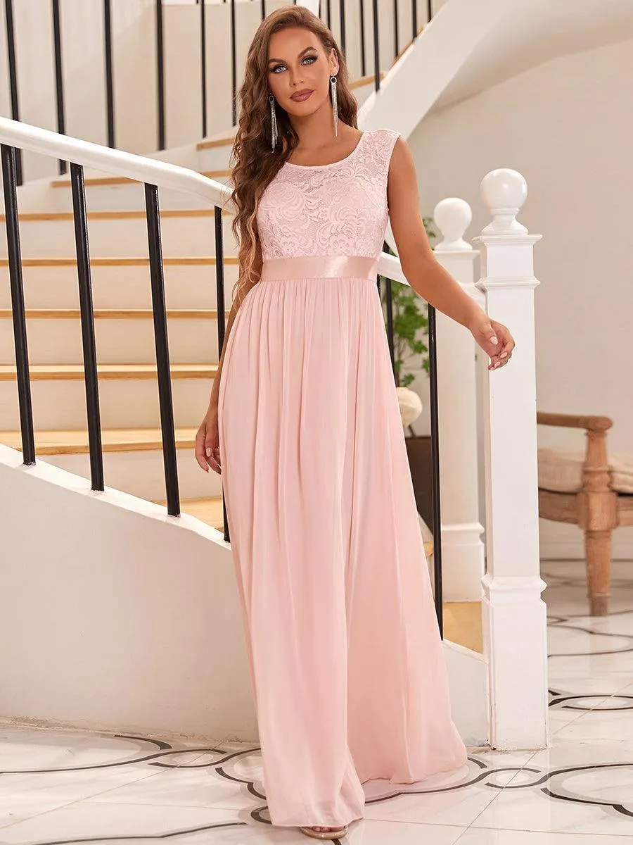 Robe mariage invitée longue en dentelle sans manches